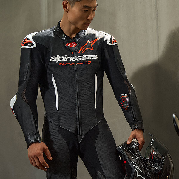 alpinestars_one-piece-suit_leather_gp-r7_black-white-red-fluo_lifestyle1.jpg