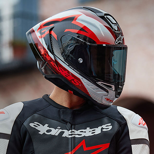 alpinestars_racing-motorcycle-helmet_supertech-r10_team-gloss-black-carbon-red-white_lifestyle2.jpg