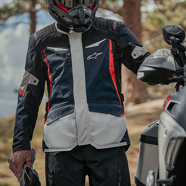 alpinestars_textile-jacket_st-1-waterproof_dark-blue-black-bright-red_lifestyle1.jpg