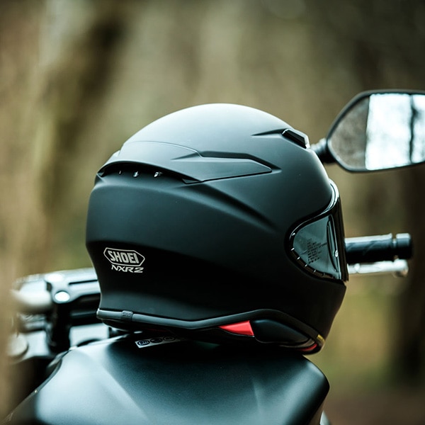 shoei_helmets_nxr-2_matt-black_lifestyle2.jpg