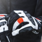 alpinestars_leather-gloves_smz-z-drystar_black-white-fluo-red_lifestyle-13.jpg