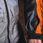 dainese_textile_jacket_air-tourer_frost-grey-flame-orange-black_lifestyle5.jpg