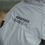 oxford_waterproofs_rainseal-over-jacket_bright_lifestyle3.jpg